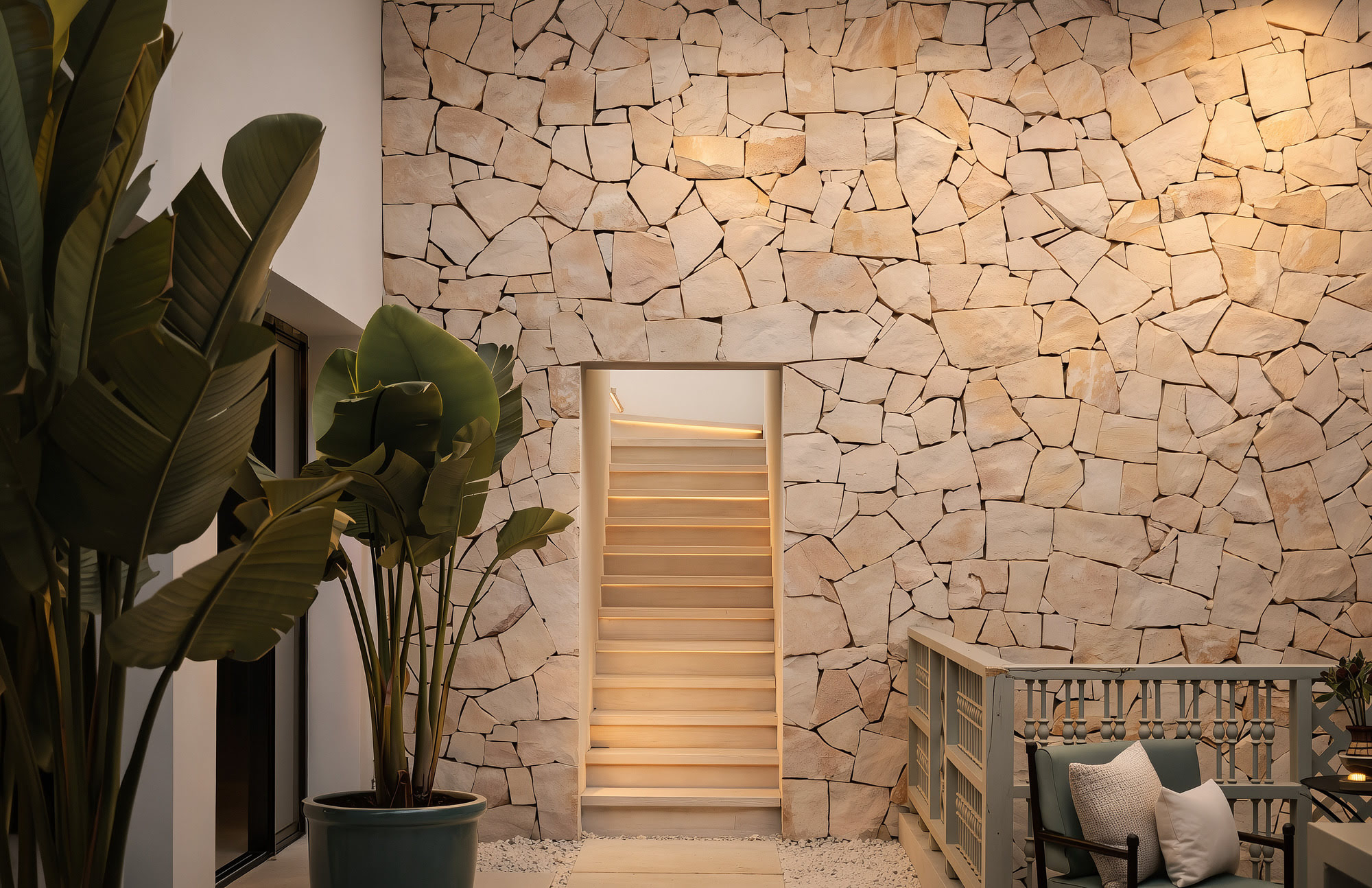 Stone wall and stair detail with warm lighting and tropical planting, Villa Africa in Nueva Andalucía, Marbella