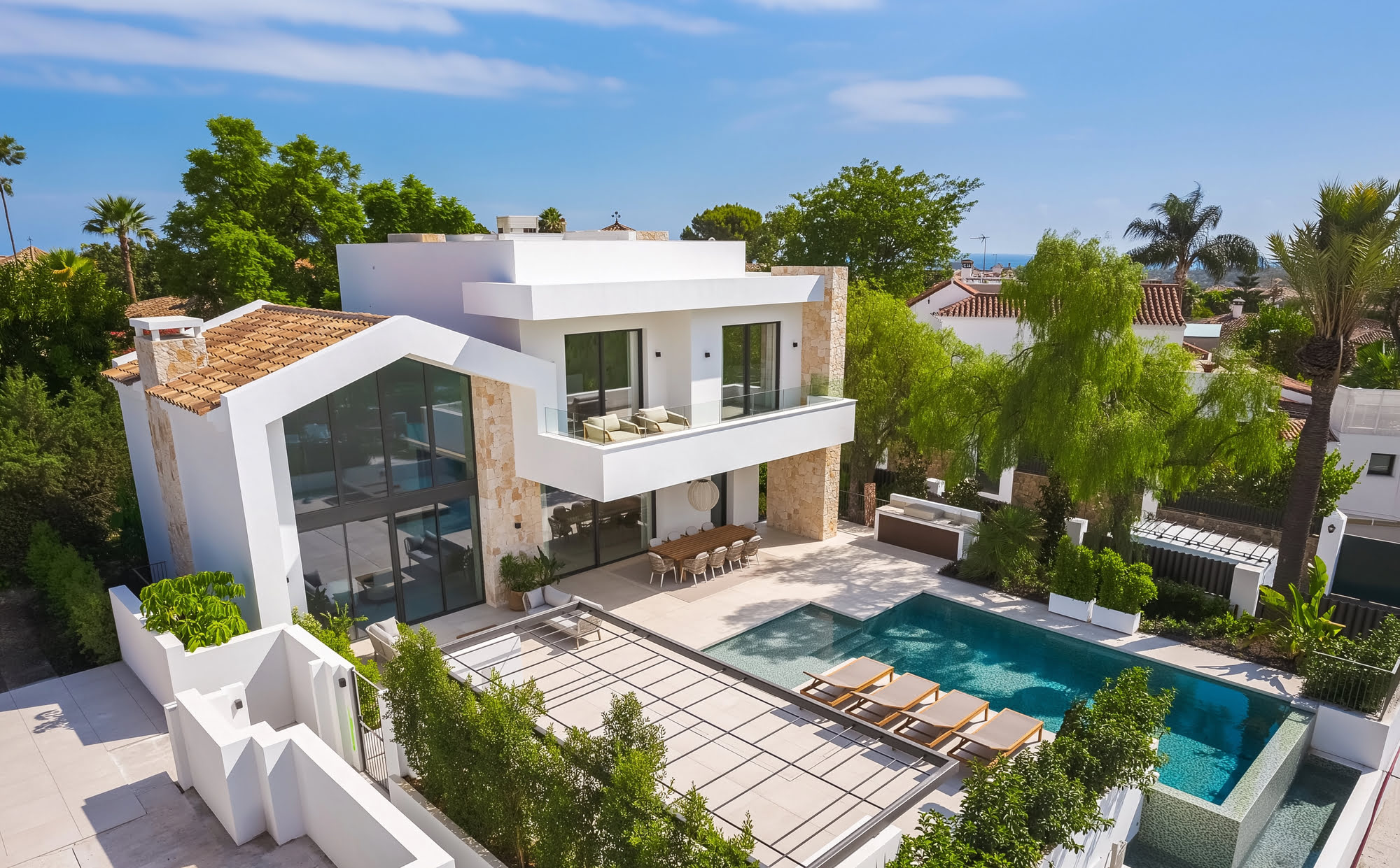 AVA Villas master view showing the residential development surrounded by Mediterranean landscaping in Guadalmina San Pedro Marbella