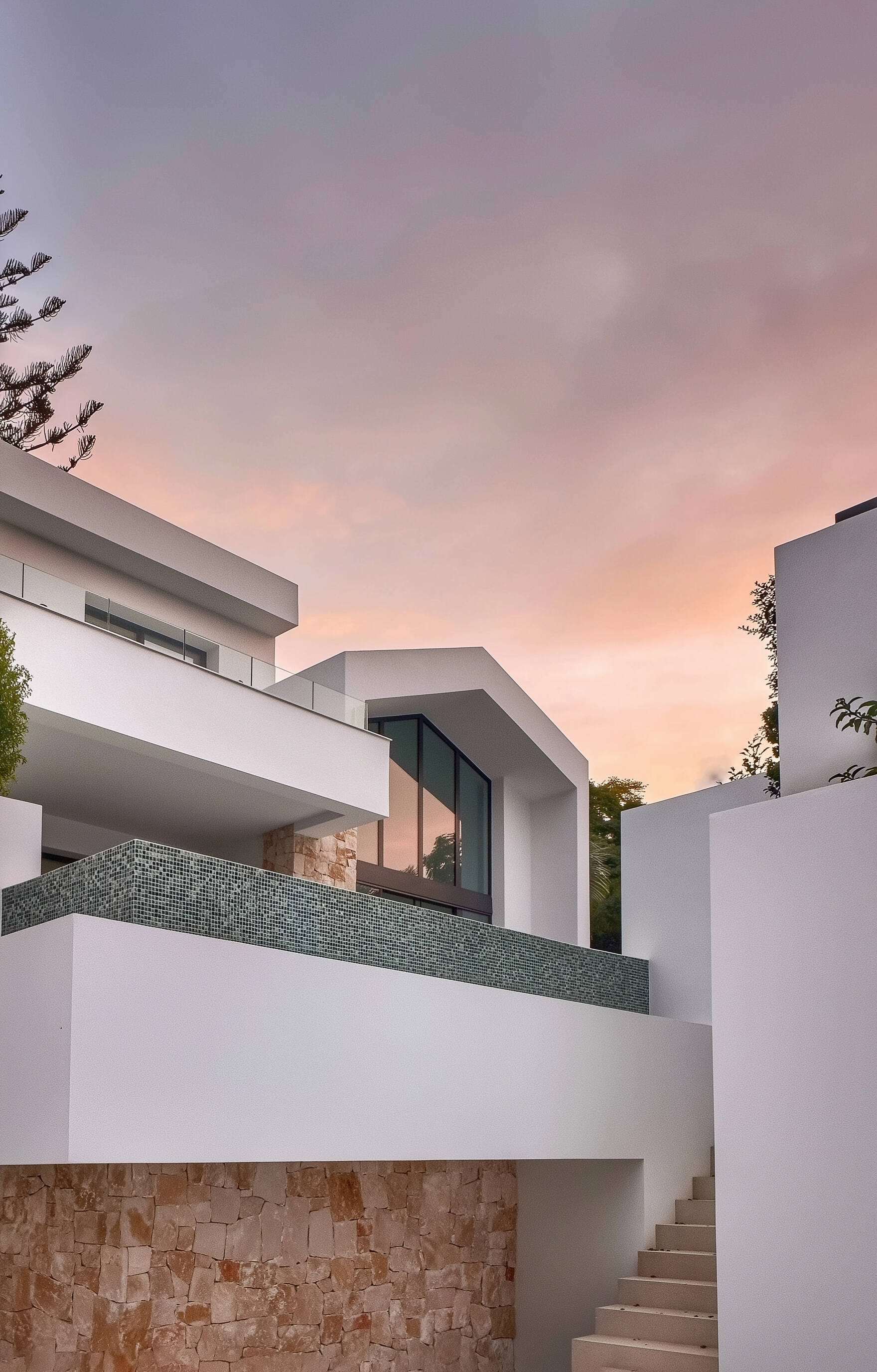 Villa terrace at sunset with warm Mediterranean sky