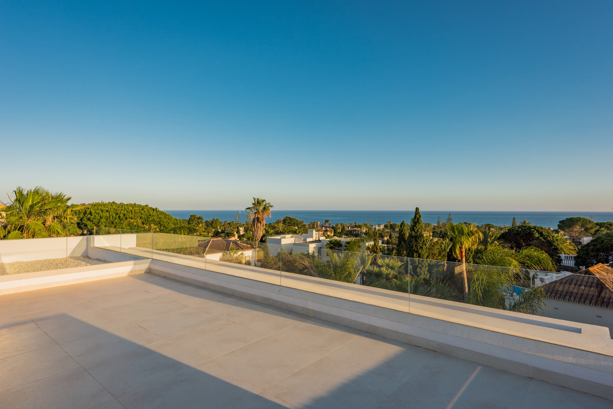 Open roof terrace of M152 with panoramic views across Marbella East and the surrounding landscape