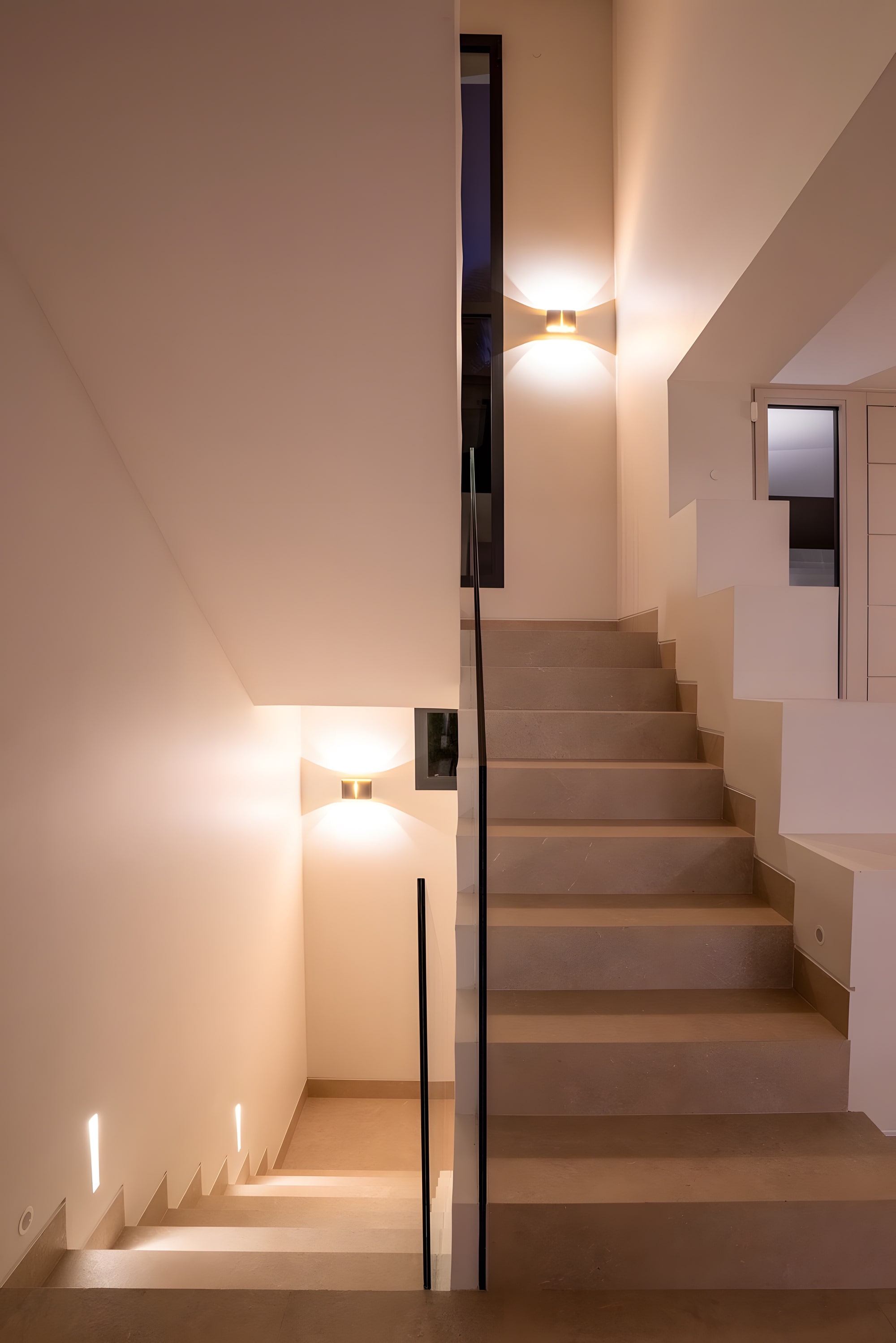 Architectural staircase with vertical lighting accent and elegant contemporary detailing