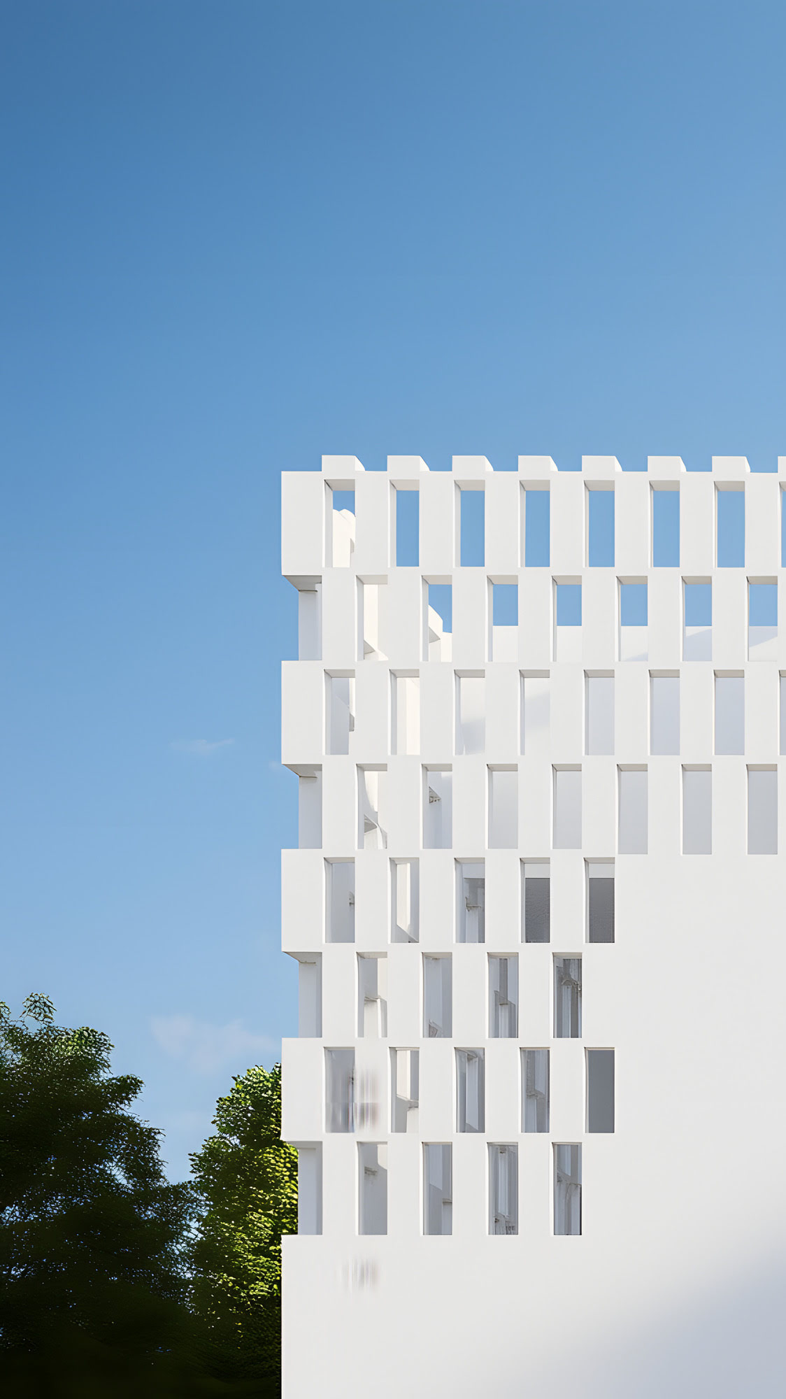 Architectural detail of the perforated white façade at Villa Río Verde, highlighting texture, shadow and geometric rhythm