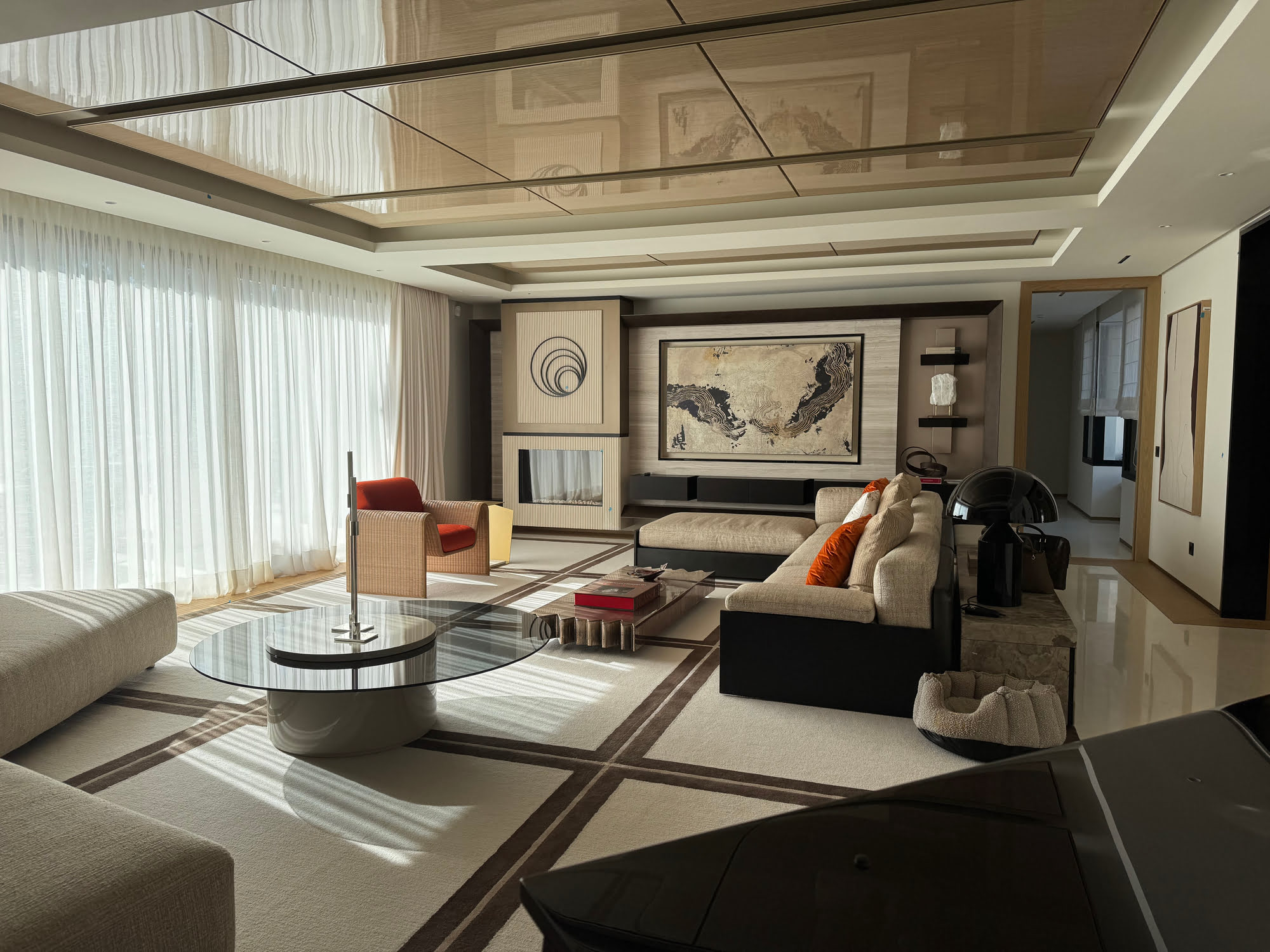 Formal living room inside Villa Shangri-La with layered ceiling, artwork and elegant residential styling