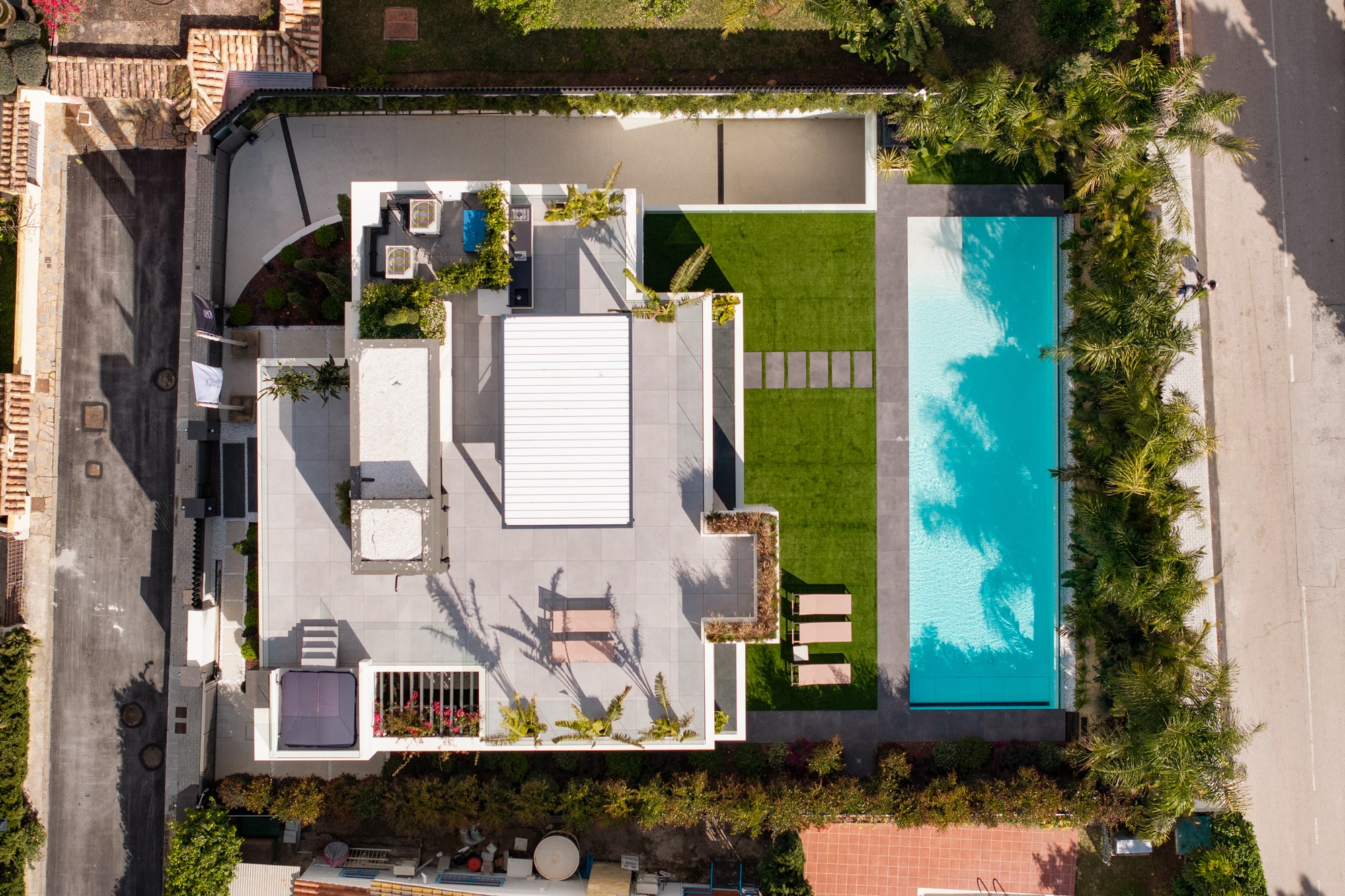 Top view of Casa Velázquez revealing rooftop terrace, pool layout and the relationship between architecture and outdoor living