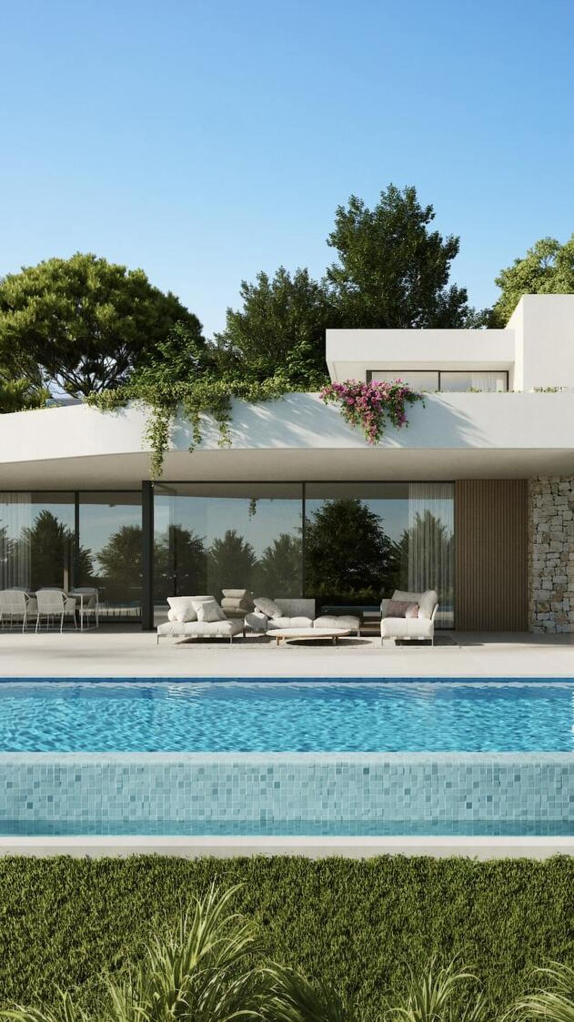 Centered vertical composition of Villa Venezuela with pool edge, pergola and layered outdoor living framed by tropical planting