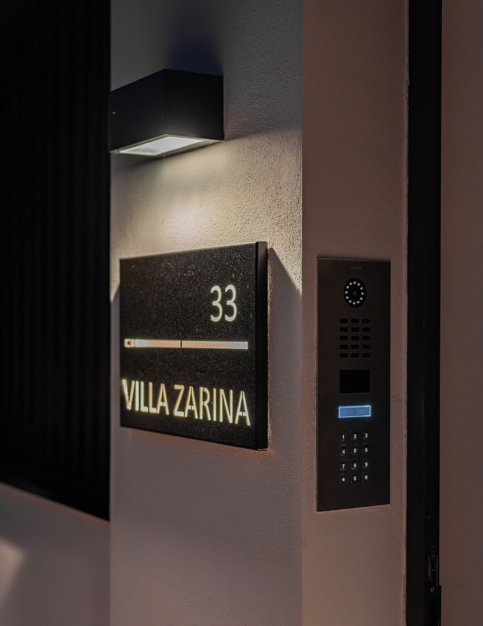 Villa Zarina entrance signage in La Cerquilla, Marbella, with refined façade detailing and understated luxury identity